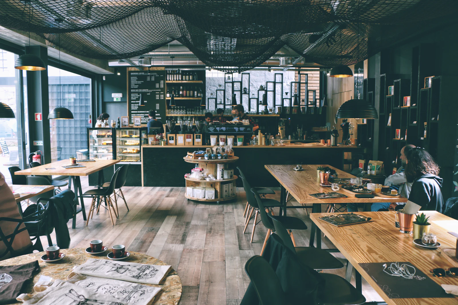 Large café room with long shared tables